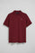 Maroon short-sleeve polo shirt with three buttons and Rigby Go embroidered logo