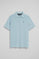 Light-blue short-sleeve polo shirt with three buttons and Rigby Go embroidered logo