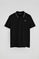 Black short-sleeve polo shirt with two buttons and chest detail