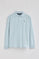 Light-blue long-sleeve polo shirt with three buttons and Rigby Go embroidery