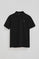 Black pique polo shirt with Rigby Go embroidered logo