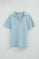 Light-blue cotton-linen polo shirt with buttonless collar and Rigby Go embroidery